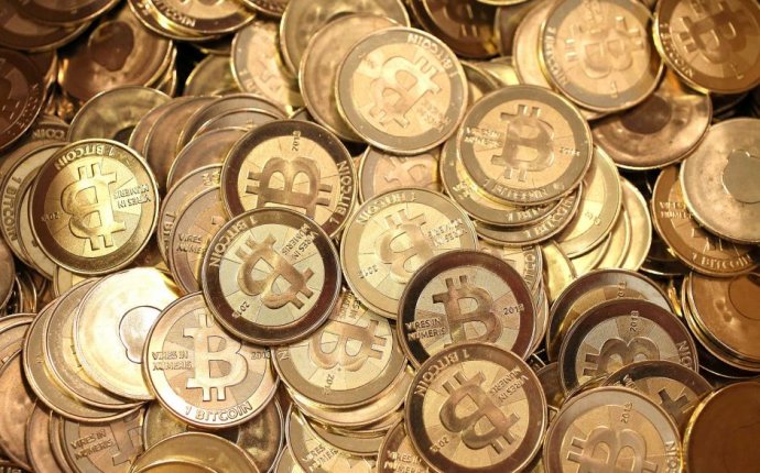 Pile of physical bitcoins - ABC News (Australian Broadcasting