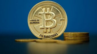 Bitcoin (virtual currency) coins are seen in an illustration picture taken at La Maison du Bitcoin in Paris, France, May 27, 2015.